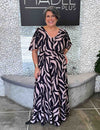 Macacão Pantalona Plus Size com Lastex Preto e Bege