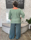 Blusa de Malha Plus Size Manga 7/8 Decote Canoa